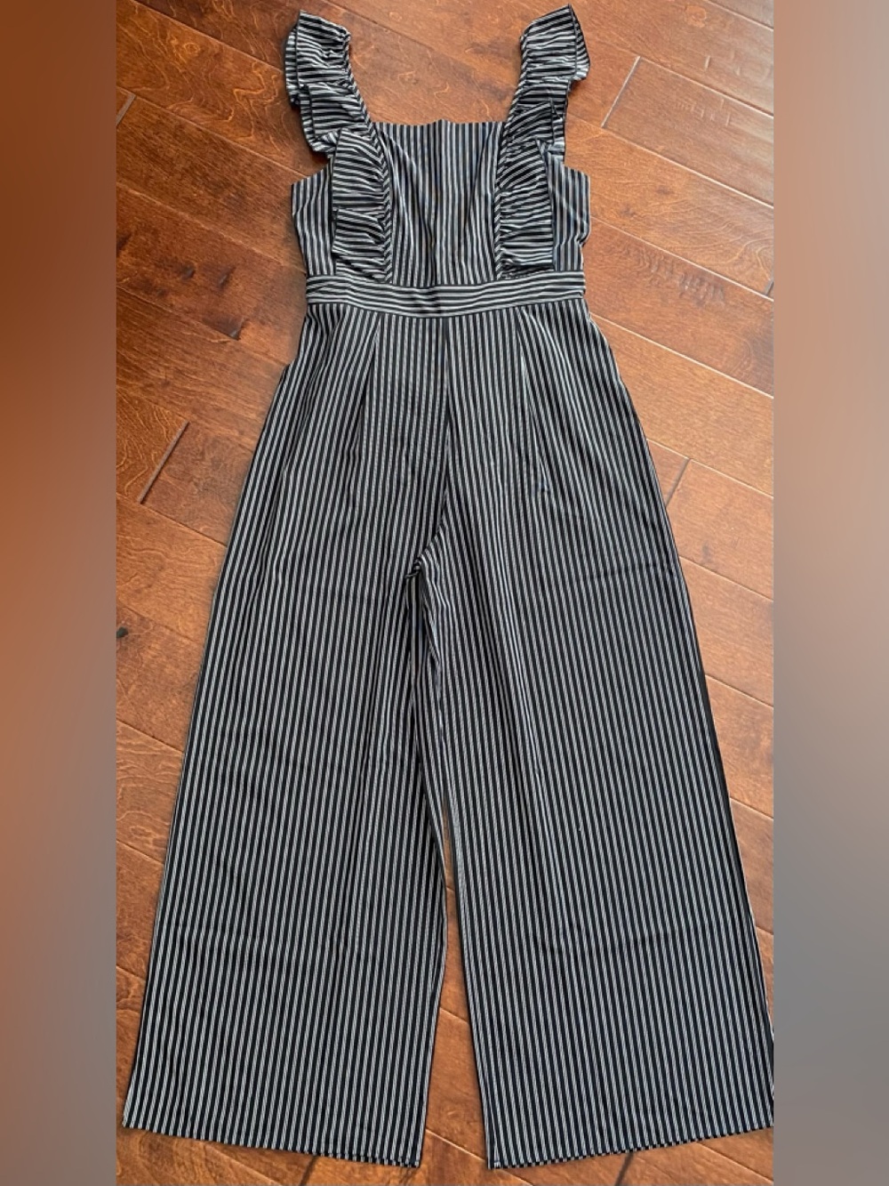 Bobou Boutique Striped Ruffle Strap Jumpsuit in Black and White. Lg.